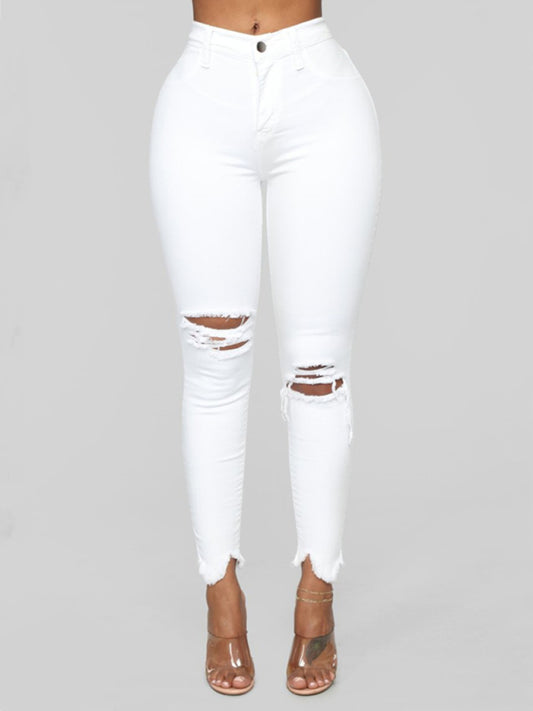 Women's elastic ripped solid color denim long trousers