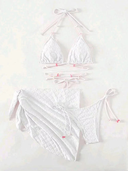 Feminine and cute three-piece bikini with floral lace pattern